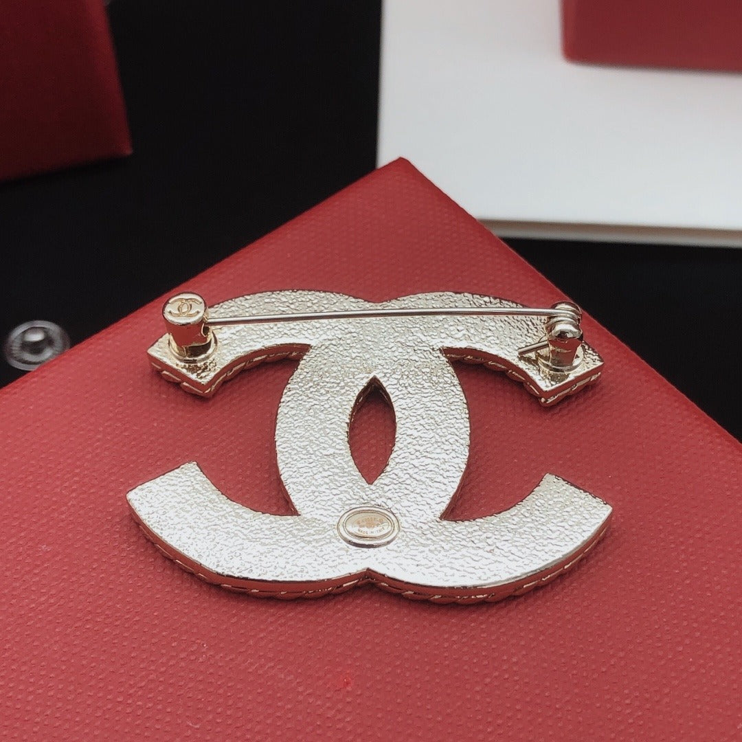 Chanel Brass Brooch