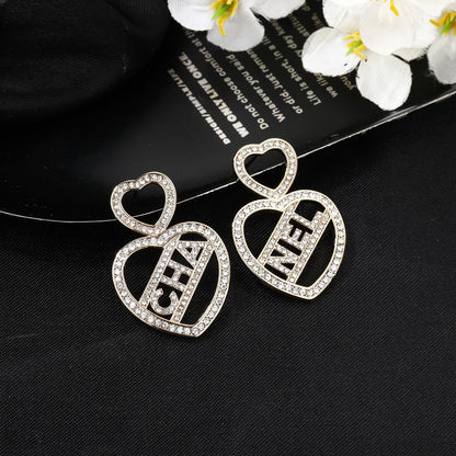 Chanel Brass Heart Earrings