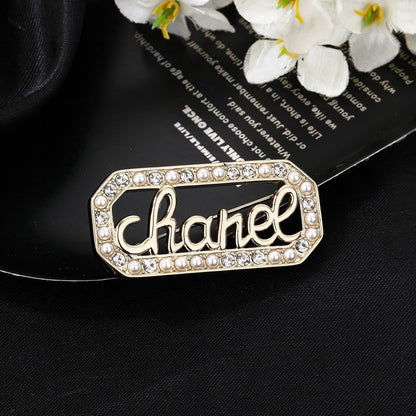 Chanel Logo Brooch