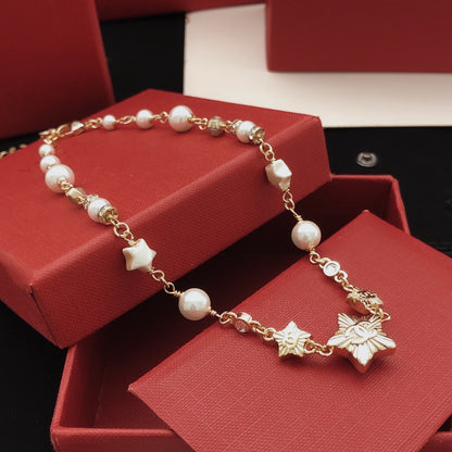 Chanel Brass Star Necklace